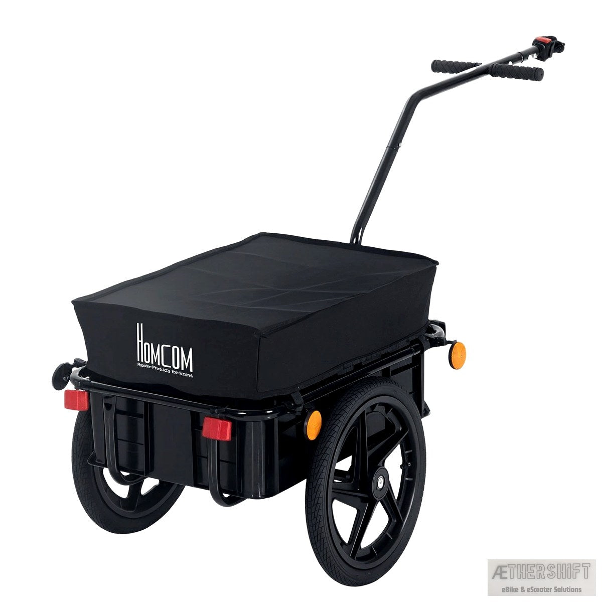 Enclosed hard-sided bike camper trailer towed behind an e-bike