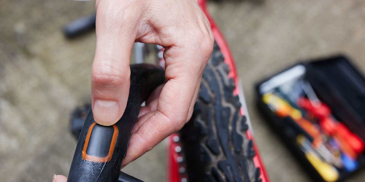 E-scooter rear flat tire repair service at AetherShift shop in Akron, Ohio